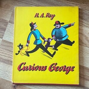 Curious George Book with Firefighters Cover